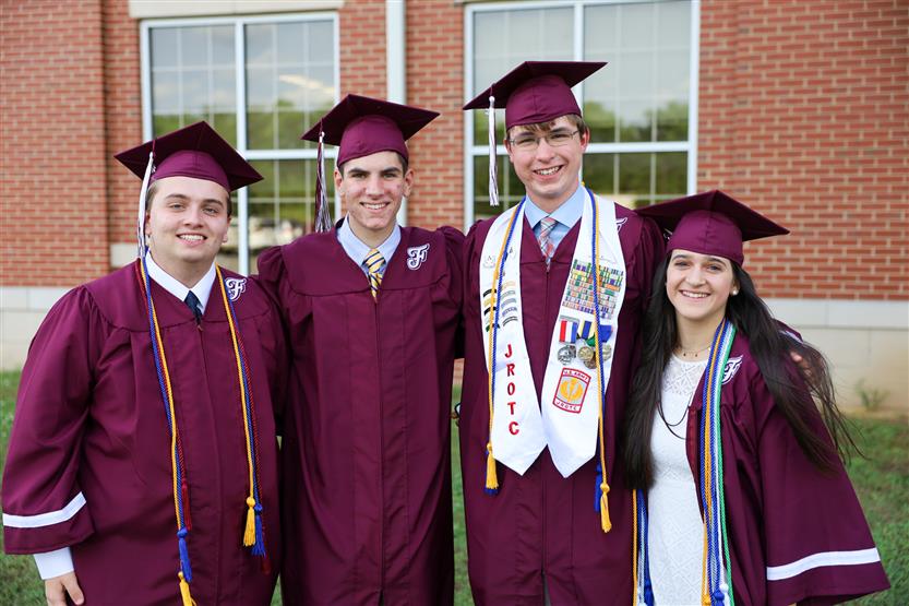 Graduates wearing maroon robes